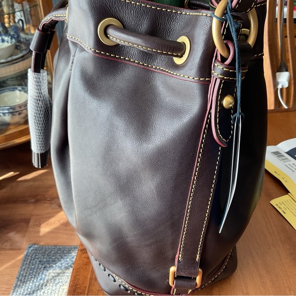 Dooney & Bourke Brown T’Moro Florentine drawstring bucket bag with whipstitch - Picture 12 of 16